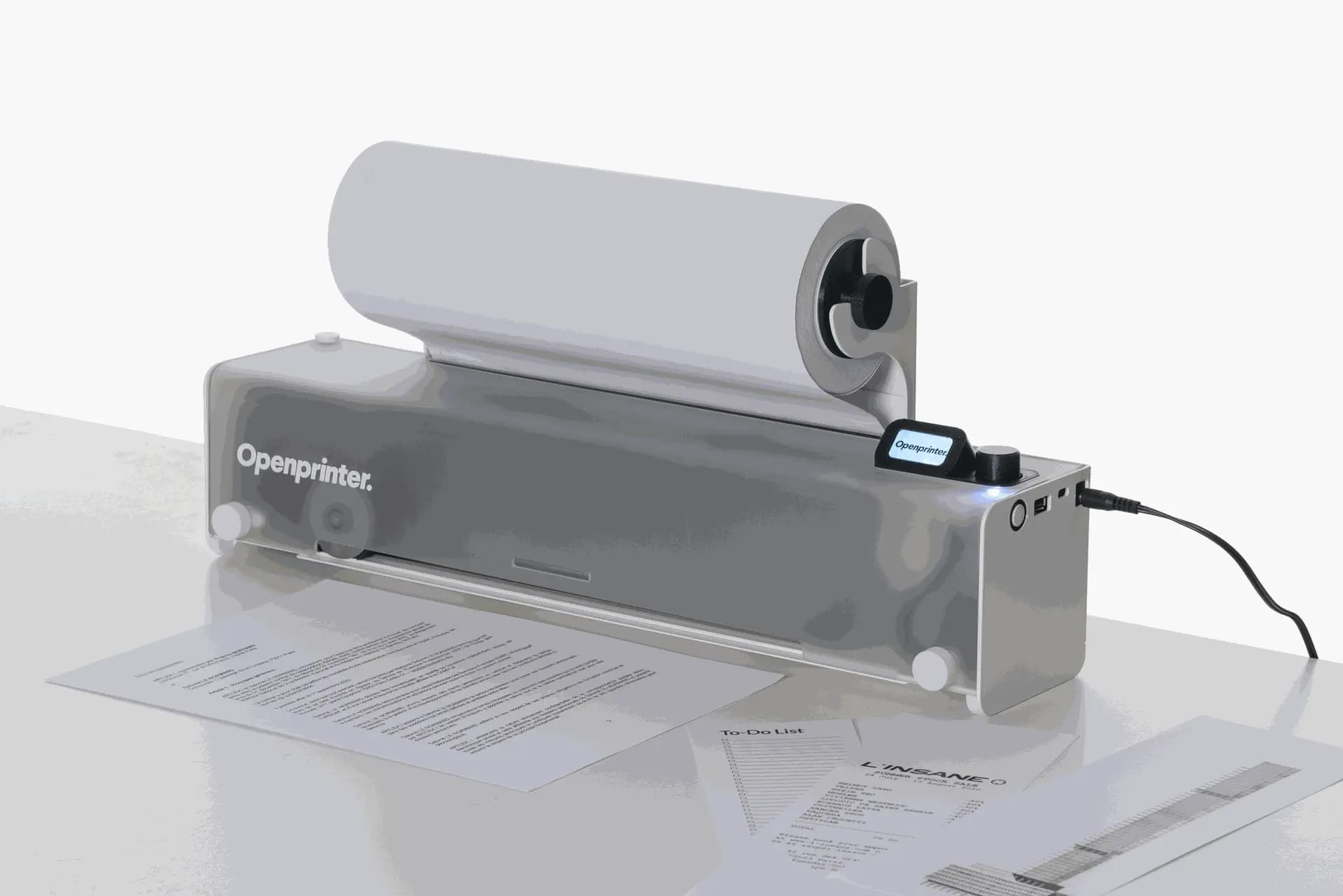 OpenPrinter打印机实物图，展示其紧凑设计和可拆解部件